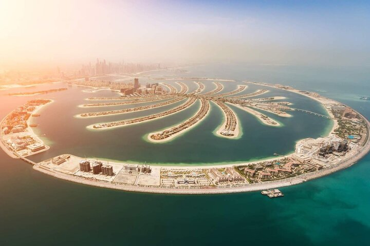 Experience the unique architecture of Dubai's Palm Island showcasing luxury resorts and stunning views of the Arabian Gulf perfect for memorable photos and a quick city overview.